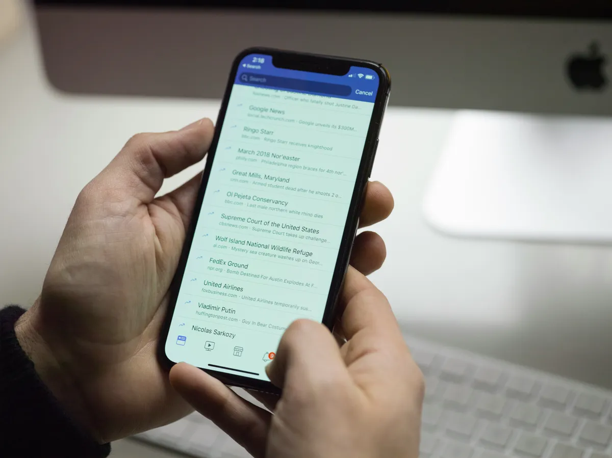 app in a person's hands
